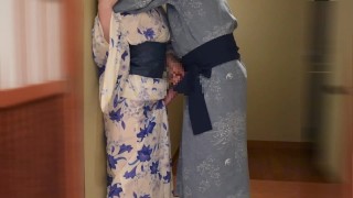 In the corridor of a hot spring inn lovey-dovey couple