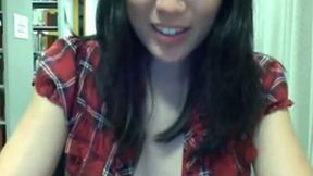 Quite naughty slender Asian girl flashes her tits on cam in the library