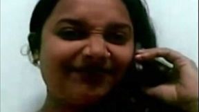 Dark haired Indian plump nympho tickles both of her fuck holes a bit